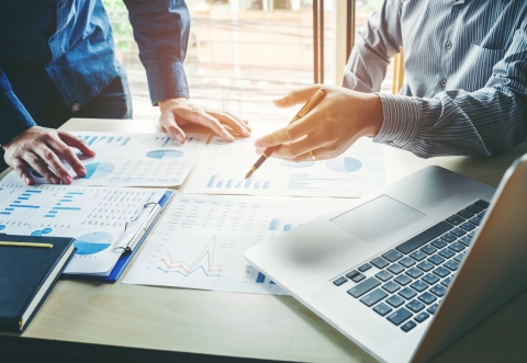 People writing a document